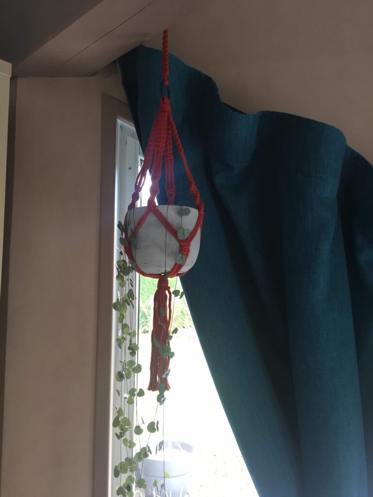 suspension pot fait mains